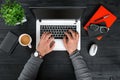 Directly above view of human hands typing on laptop. Royalty Free Stock Photo