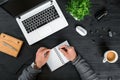 Directly above view of human hands typing on laptop. Royalty Free Stock Photo