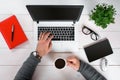 Directly above view of human hands typing on laptop. Royalty Free Stock Photo