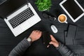 Directly above view of human hands typing on laptop. Royalty Free Stock Photo