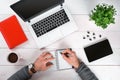 Directly above view of human hands typing on laptop. Royalty Free Stock Photo