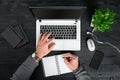 Directly above view of human hands typing on laptop. Royalty Free Stock Photo