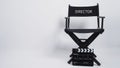 Director chair and Clapper board or movie slate use in video production or movie and cinema industry. It`s black color