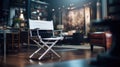 Director's chair, blurry film set in the background Royalty Free Stock Photo