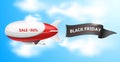 Dirigible with banner. Realistic zeppelin flying in blue sky, fluttering textile ribbon, black friday sale, isolated airship, Royalty Free Stock Photo
