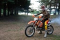 Dirt bike rider on his KTM 200 EXC motorbike