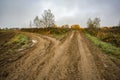 Dirt clay road. Fork.