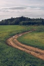 Dirt clay road in the field