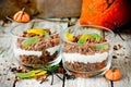 Dirt cups with gummy worms , Halloween dessert Royalty Free Stock Photo