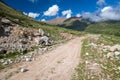 Dirt mountain road. Kyrgyzstan Royalty Free Stock Photo