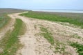 The dirt road along the river bank Manych. Kalmykia