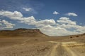 Dirt road in Atacama desert, volcanic arid landscape in Chile, South America Royalty Free Stock Photo