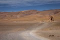 Dirt road in Atacama desert, volcanic arid landscape in Chile, South America Royalty Free Stock Photo