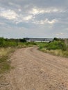 Dirt road in the countryside of Thailand and blue sky Royalty Free Stock Photo