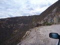 Dirt road curve in the mountains Royalty Free Stock Photo