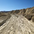 Dirt road in Death Valley National Park. Royalty Free Stock Photo