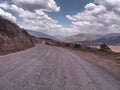 dirt road and distant mountains