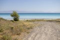 Dirt road by the lake. landscape photo. Royalty Free Stock Photo