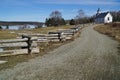 Dirt road leading to a church