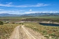 A dirt road leads to the Oakley Dam and Lower Goose Creek Reservoir in Oakley, Idaho, USA