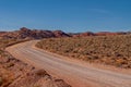 Dirt road makes wide turn in Valley of Fire, Nevada, USA