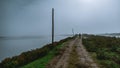 A dirt road with a man silhouette Royalty Free Stock Photo