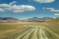 Dirt road in Moon Valley dramatic landscape at Sunset, Atacama Desert, Chile Royalty Free Stock Photo