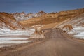 Dirt road in Moon Valley dramatic landscape at Sunset, Atacama Desert, Chile Royalty Free Stock Photo