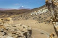 Dirt road in Moon Valley dramatic landscape at Sunset, Atacama Desert, Chile Royalty Free Stock Photo