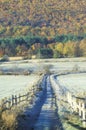 A dirt road with morning autumn frost in Tyringham, Massachusetts