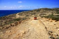 Dirt road on a mountain slope. Greece. Rhodes Royalty Free Stock Photo