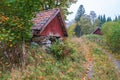 Dirt road with a old root cellar in autumn Royalty Free Stock Photo