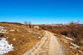 Dirt Road and Old Farmhouse on Lessinia High Plateau - Verona Province Italy Royalty Free Stock Photo