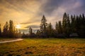 Dirt road and old wooden houses under High Tatra Mountains in Poland Royalty Free Stock Photo