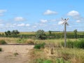 Dirt road and prairie railroad crossing