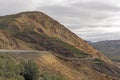 Dirt Road Through a Rugged Mountain Pass