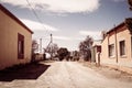 A dirt road running through a small town in rural Karoo region of South Africa Royalty Free Stock Photo