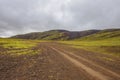 Dirt road to Thjofadalir valley in Iceland highlands. Cloudy sum