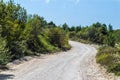 Dirt road turning left Royalty Free Stock Photo