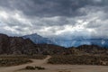 Dirt roads in the Alabama Hills in Lone Pine California, as a downburst of rain moves through the area. Many Western classic Royalty Free Stock Photo