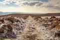 Dirt salt road in Atacama desert, moon valley arid landscape in Chile Royalty Free Stock Photo