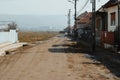 Dirt street in Eastern Europe city Royalty Free Stock Photo