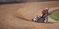 Dirt-track rider at high speed