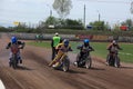 Dirt track riders at start