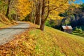 Dirt unpaved road at autumn in Vermont, USA Royalty Free Stock Photo