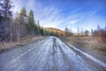 Dirt, Unpaved Road Covered In Ice