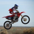 Dirtbike in mid-air.