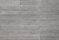 dirty aged gray brick textured wall for vintage style interior design background.