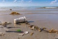 Dirty beach or Spilled garbage on beach