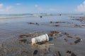 Dirty beach or Spilled garbage on beach